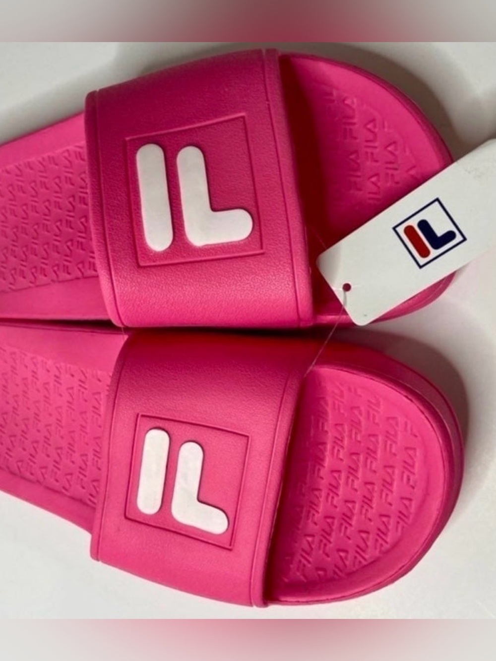 Women’s size 7 Bright Pink Slide Sandals with White Fila Logo